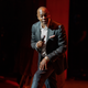 Dave Chappelle performs at a dedication ceremony for the theater honoring the comedian and actor, and to raise money in support of the Duke Ellington School of the Arts in Washington, on Monday June. 20, 2022.